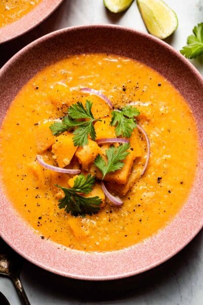 butternut squash thai curry soup in a bowl from the top view