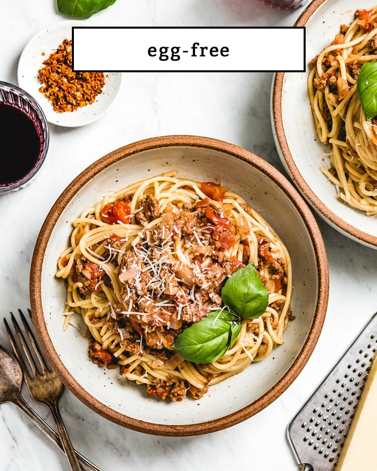 A bowl of spaghetti bolognese representing egg free recipes