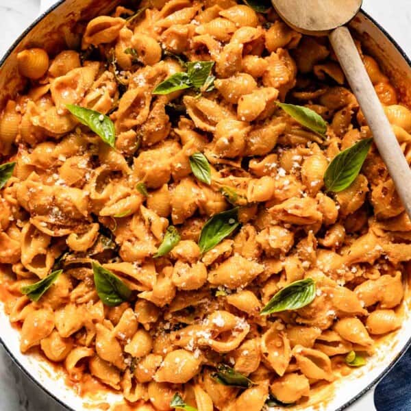 Spicy pasta with vodka sauce in a skillet from the top view.