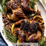 Grilled game hens on a plate with text on the image.