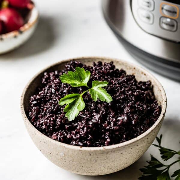 Instant pot black rice in a bowl from the front