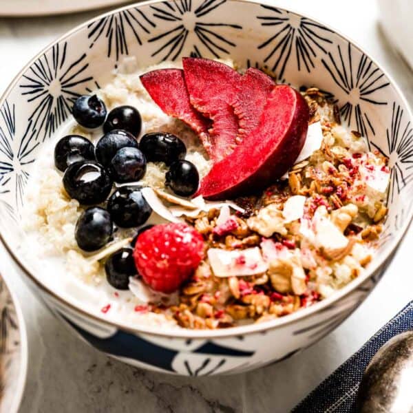 Instant Quinoa Breakfast topped off with nuts, granola and fruit.