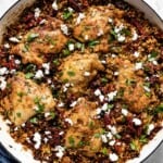 Mediterranean Bulgur with Chicken in a skillet from the top view.