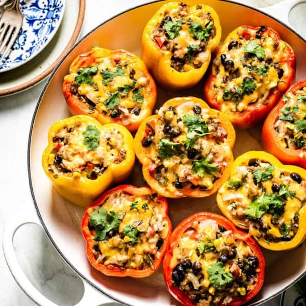 Mexican Stuffed Peppers in a white skillet from top view
