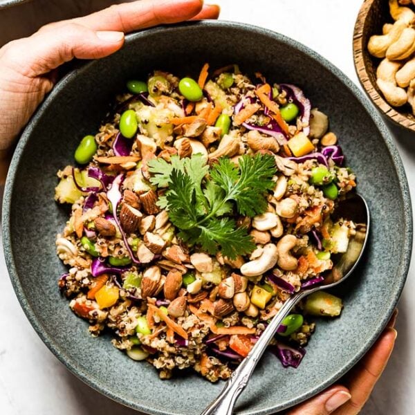 Thai Quinoa Salad in a bowl being served by a person