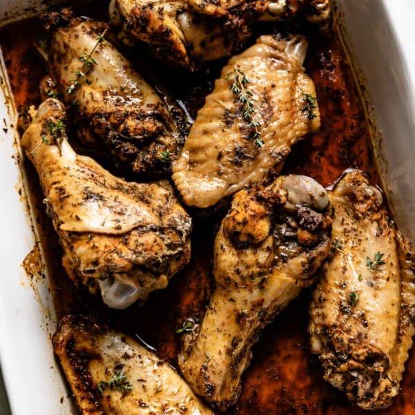 Baked turkey wings freshly baked in a baking dish.